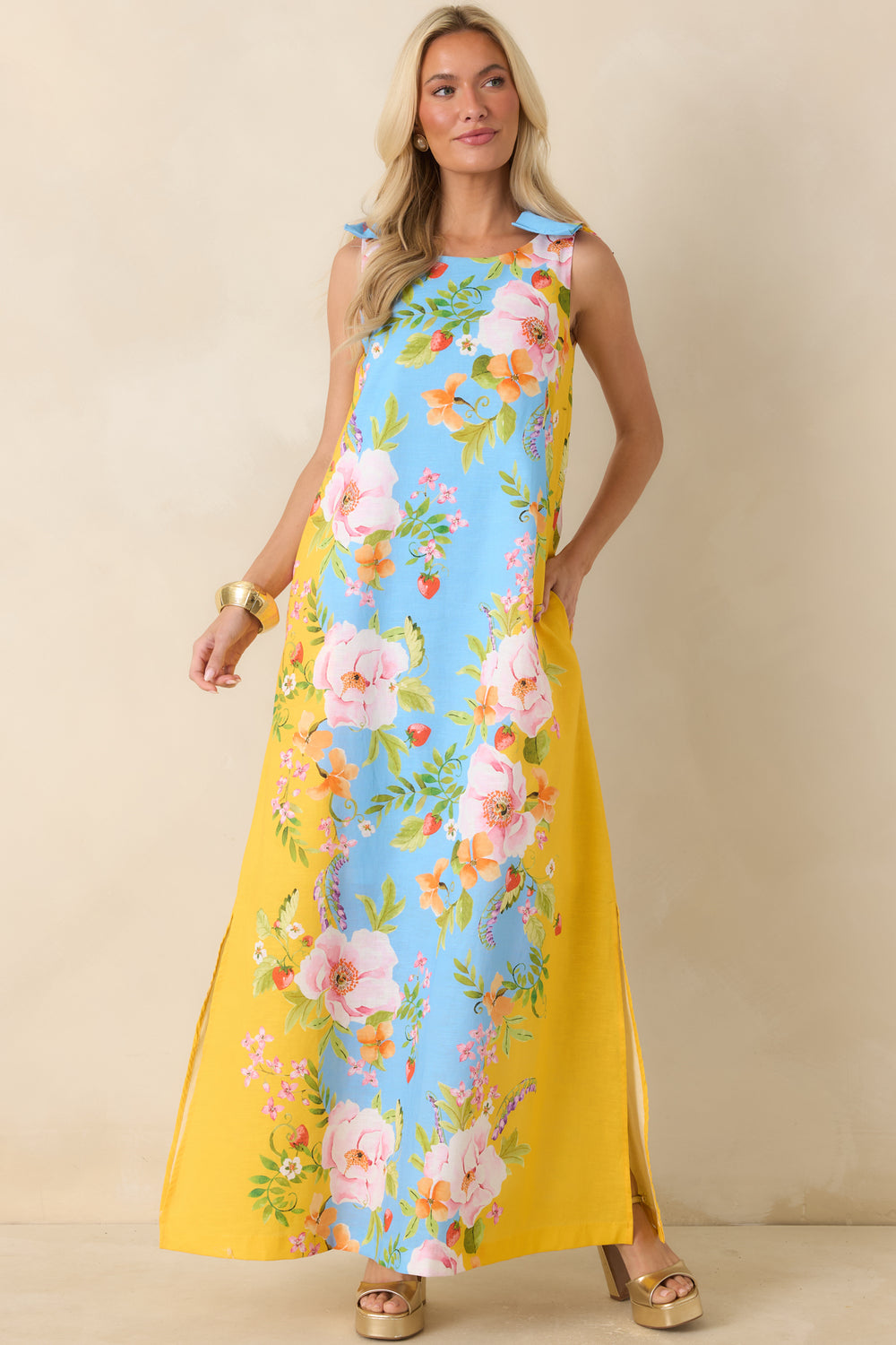 Blue-And-Yellow-Floral-Maxi-Dress-Featuring-A-Round-Neckline
