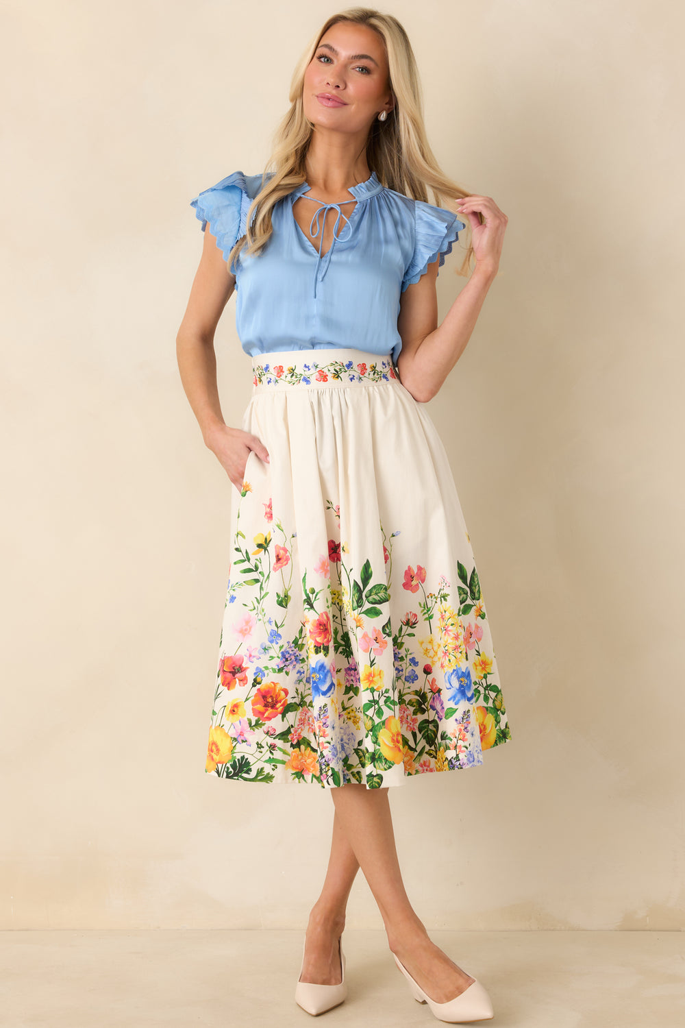 Blue-Blouse-With-A-V-Neckline-And-Semi-Sheer-Fabric