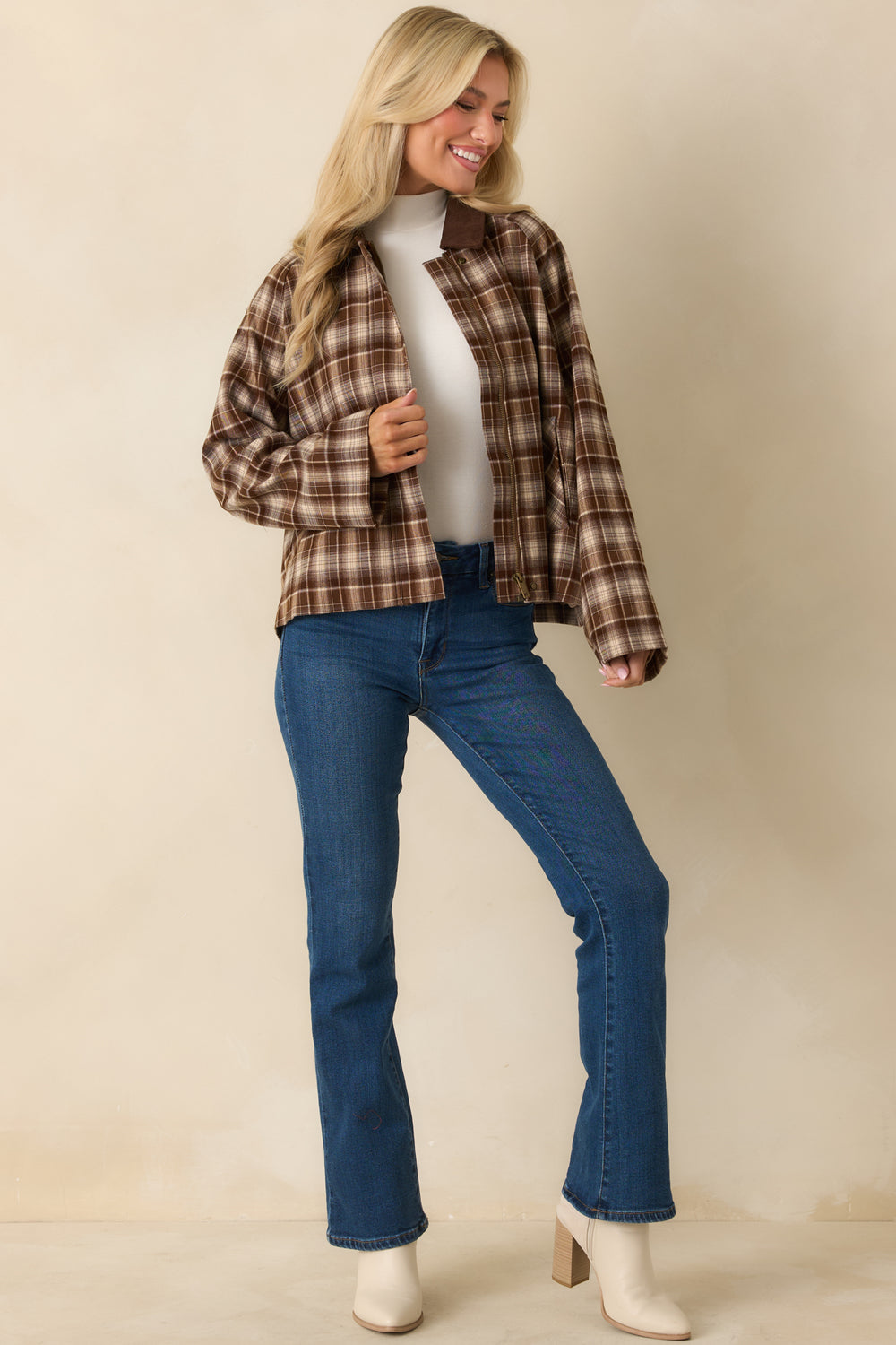 Brown-Jacket-Displaying-Functional-Side-Pockets-And-Smooth-Finish