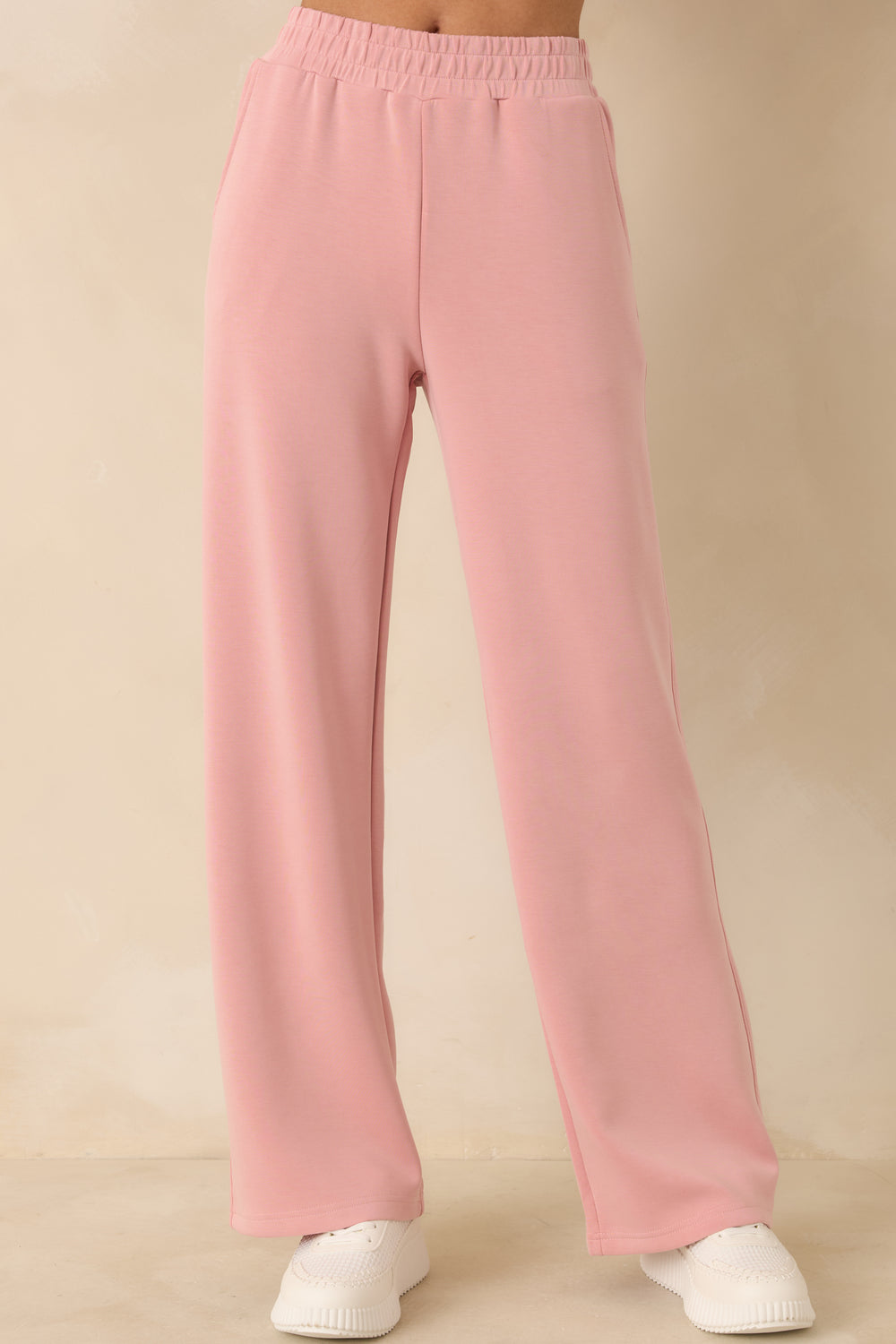 Close-View-Of-Elastic-Waistband-On-Powder-Pink-Pants