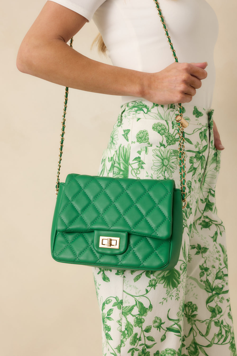 Green-Quilted-Handbag-Emphasizing-The-Flap-Design