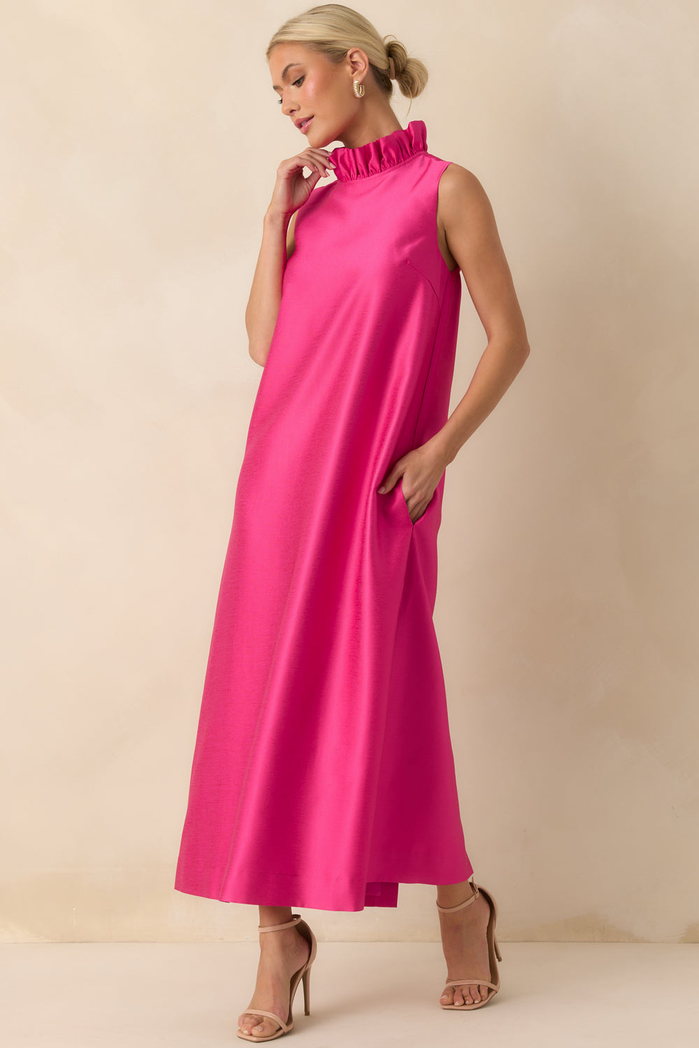 Hot-Pink-Sleeveless-Maxi-Dress-With-A-Ruffle-Mock-Neckline