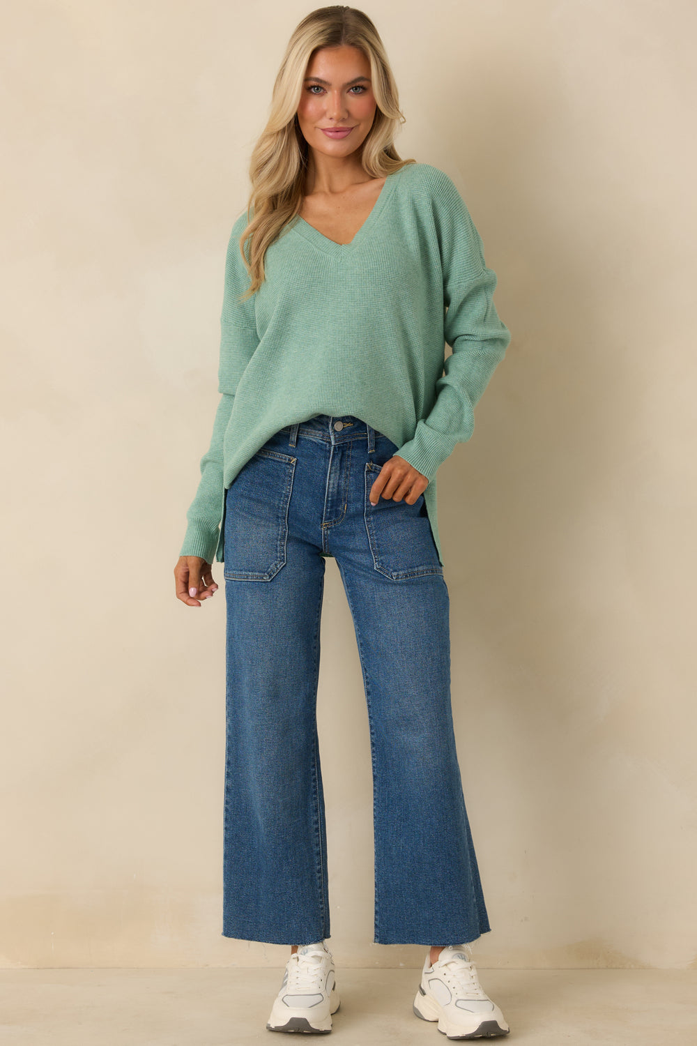 Light-Green-Sweater-With-A-V-Neckline-And-Long-Sleeves