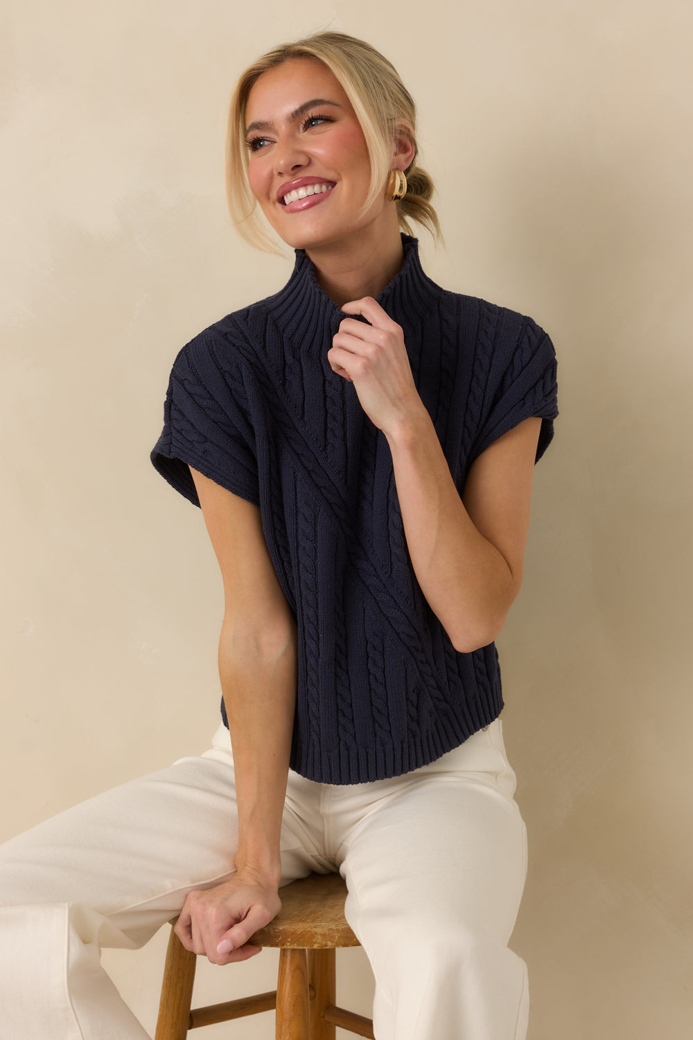 Navy-Sleeveless-Sweater-With-A-Mock-Neckline-And-Relaxed-Silhouette