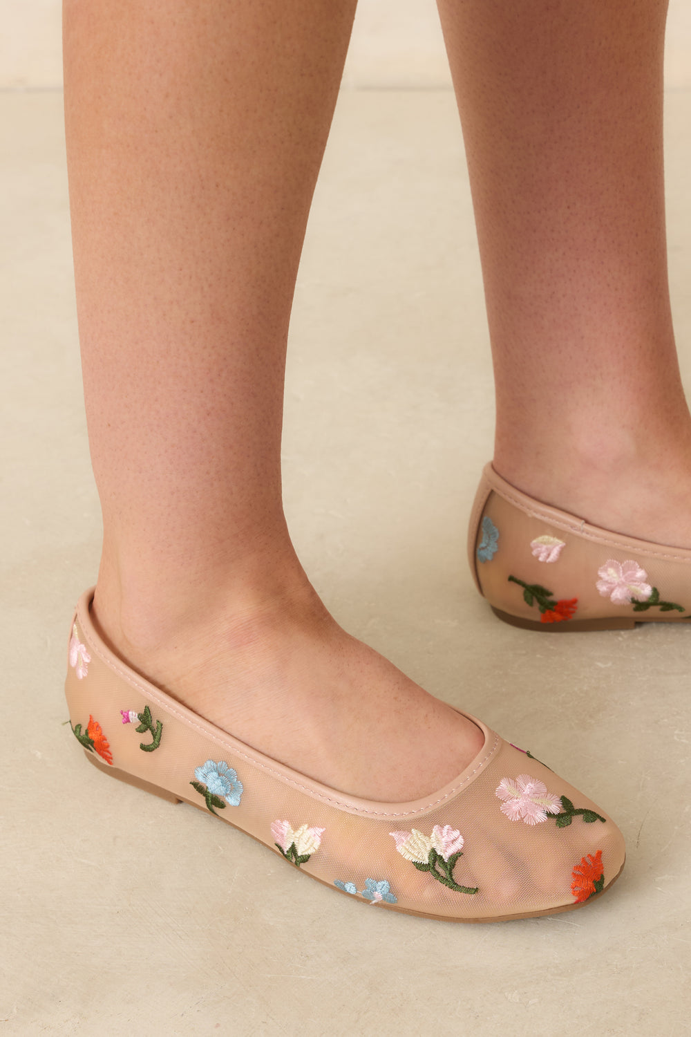Nude-Mesh-Flats-Featuring-Intricate-Floral-Embroidery-And-Sheer-Texture