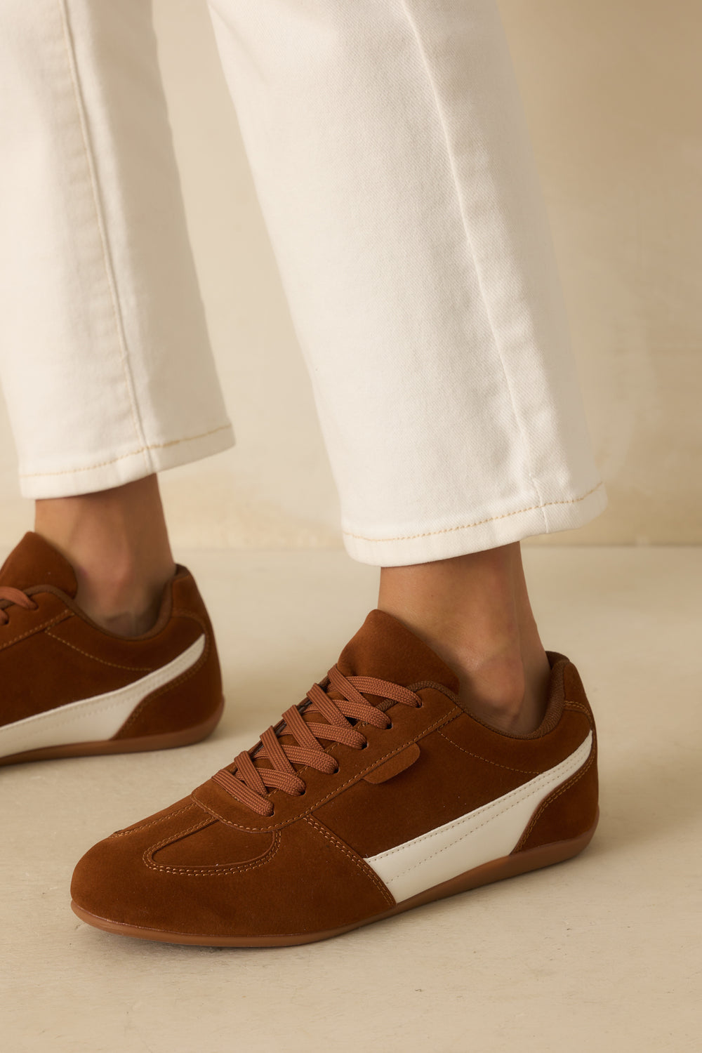 side-view-brown-lace-up-sneakers-flexible-sole